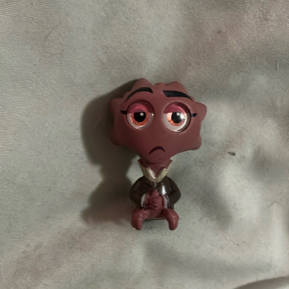 Brown Cartoon Character Figurine